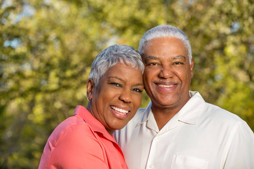 Couple outside smiling